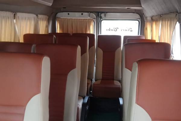 tempo traveller 12 seater price